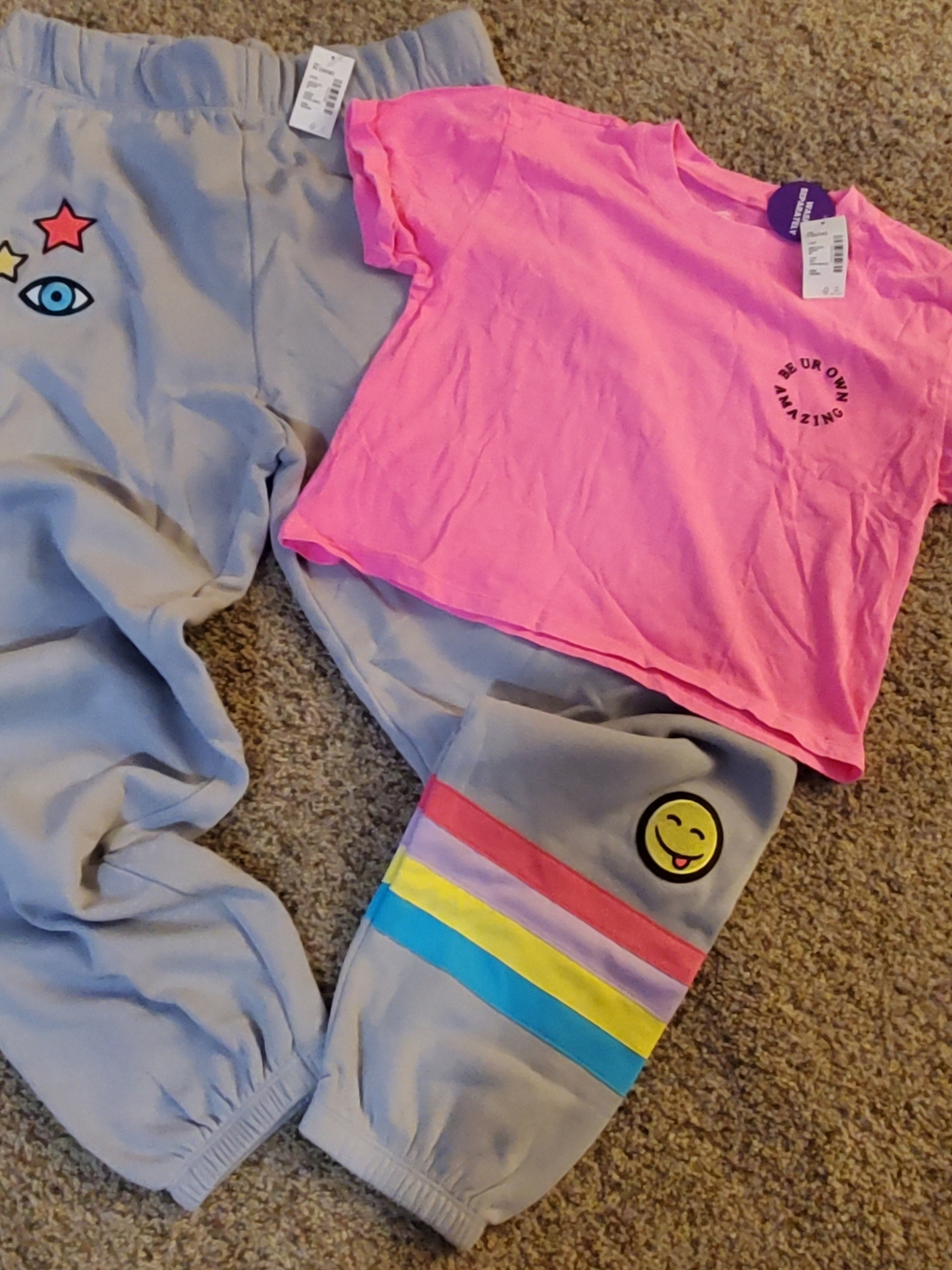 Sugar And Jade Pink Graphic Tee with Gray Joggers and Rainbow Stripes Outfit